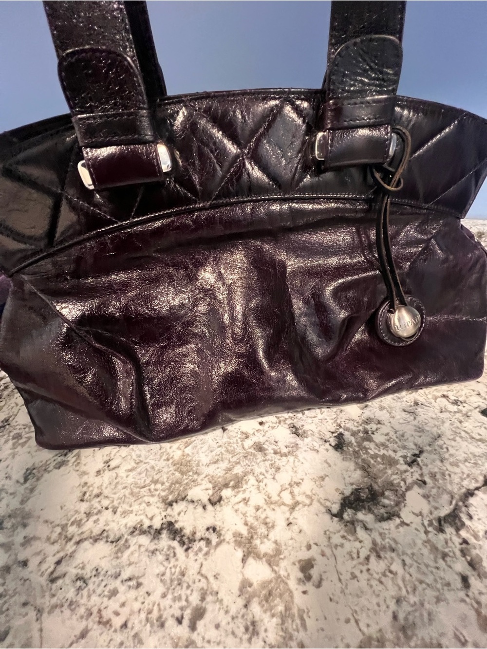Quilted Leather Shoulder Bag in Deep Plum